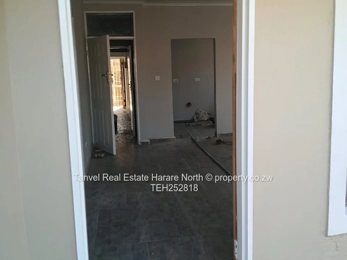 Available for Sale in Warren Park D is a neatly refurbished house with 5 Bedrooms, Lounge and kitche