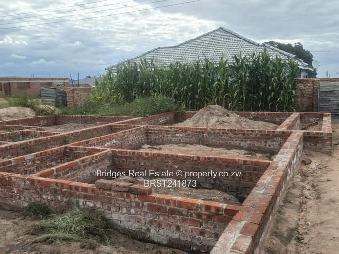 Serviced Residential Stand for Sale with Unfinished Structure