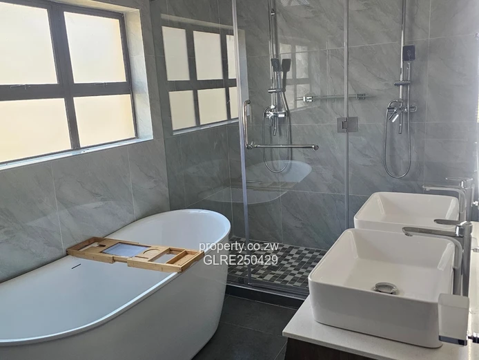 Stylish 3-Bed, 3-Bath Ashbrittle Home with Borehole