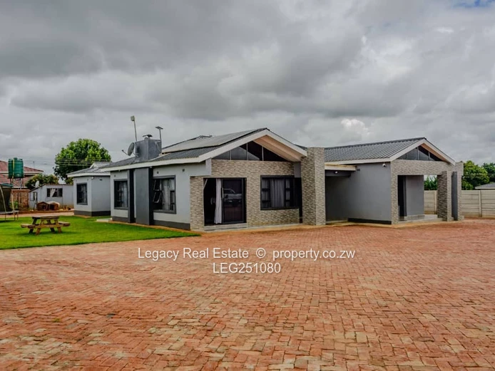 Mount Pleasant Heights: 6-Bed Townhouse Complex with Brick Yard & Borehole