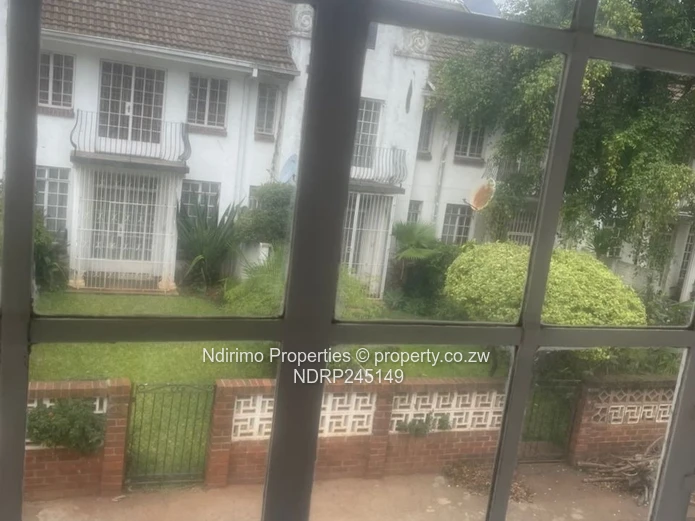 Secure 2-Bed Harare CBD Flat with Balcony, Garden & Modern Kitchen