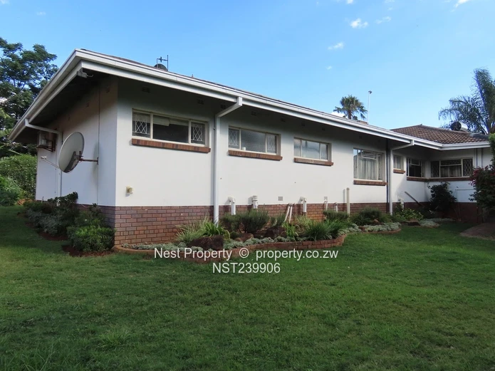 Neat, Embassy Style Home located in the heart of Gunhill!