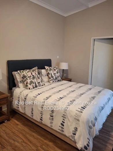 Chisipite 2-Bed Townhouse — Pool, Garden & Balcony