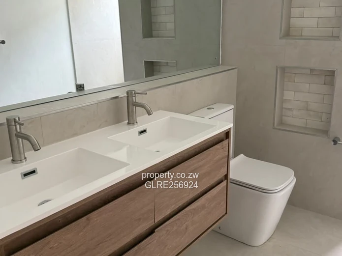 Modern 3-Bed Flat in Borrowdale with Verandah & Solar