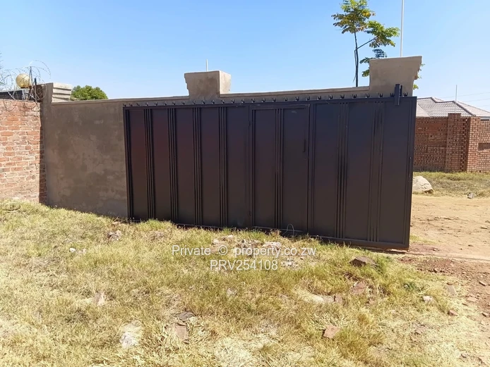5-Bed Home with Brick Wall & Metal Gate in Pomona