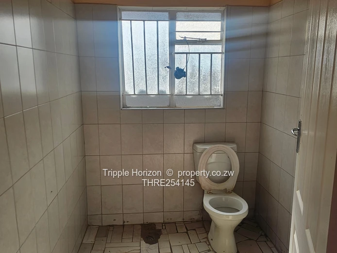 Chitungwiza unit O two houses for sale under one durawall 