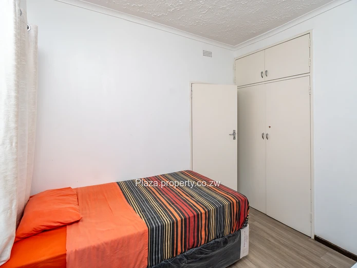 Strategically Located 4-Bedroom Family Home with Cottage – Sunridge, Harare Drive Frontage