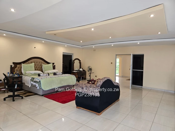 A grand palatial home- 8 bedrooms, 6 en-suite, Borehole, triple garages