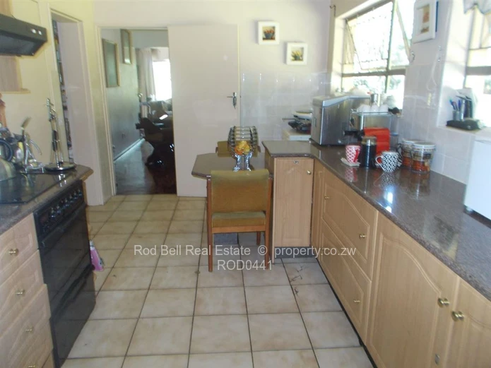 This property offers 2 homes and is set amongst stunning msasa trees