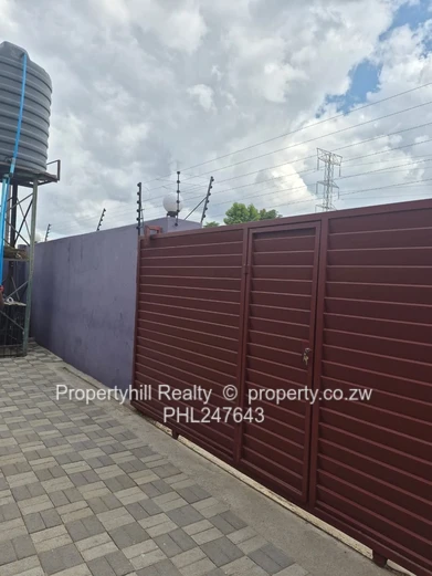 Secure 4-Bed Granary Park Home — Borehole, Garage & Paved Yard