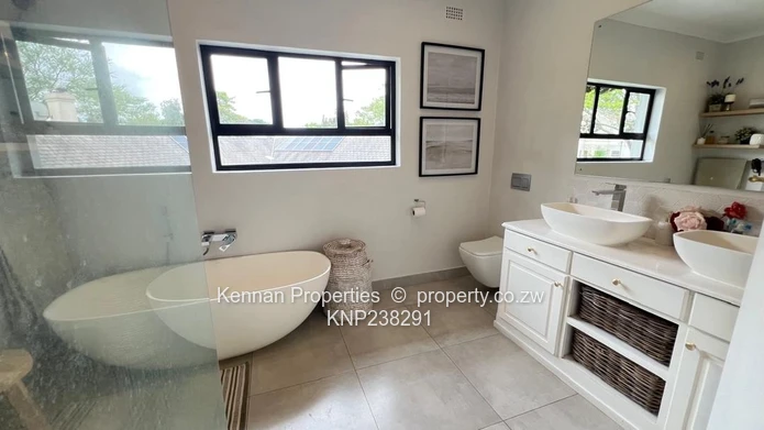 Stunning partly double storey home in Borrowdale Brooke Golf Estate overlooking the 18th Fairway. 