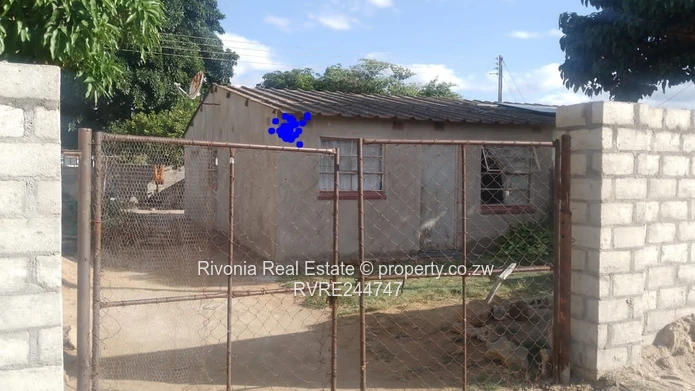 2-Bed Brick Home with Corrugated Roof & Yard, Zengeza.