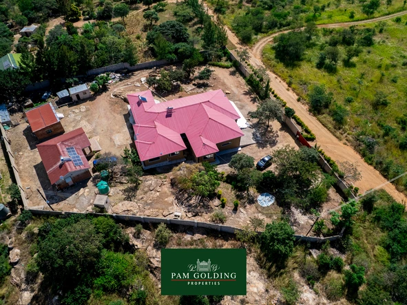 Luxurious 5-Bedroom Home with Cottages On 5800 Sqm in Mqabuko Height