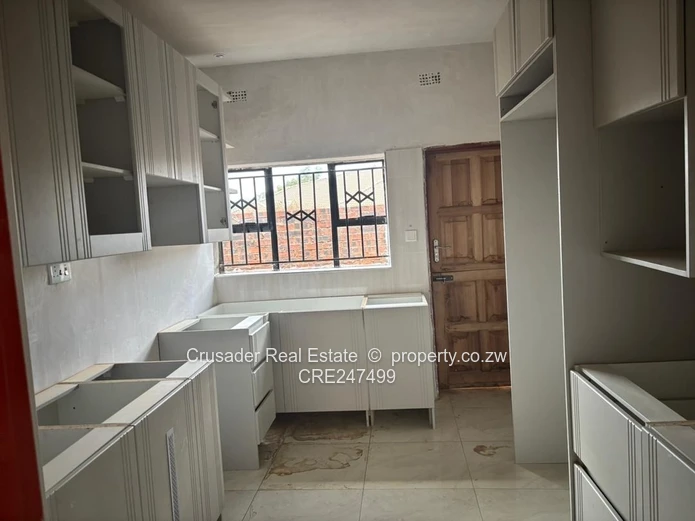 Modern 2-Bed Flat in Tynwald — Borehole & Built-ins (Sole Mandate)