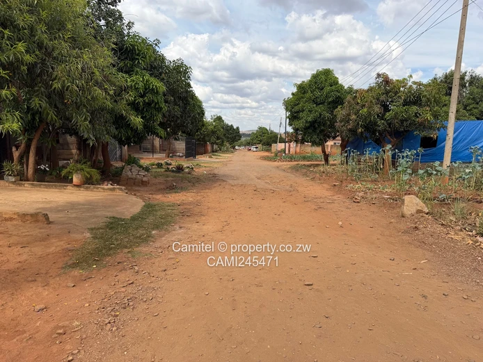 Open 13,000 m² Kuwadzana Extension Lot — Subdividable, Serviced (Sole Mandate)