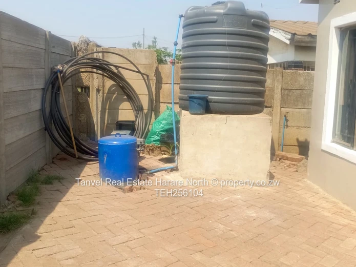Available for sale in Warren Park  is a 5 bedroomed house, with a kitchen, lounge and dining Walled 