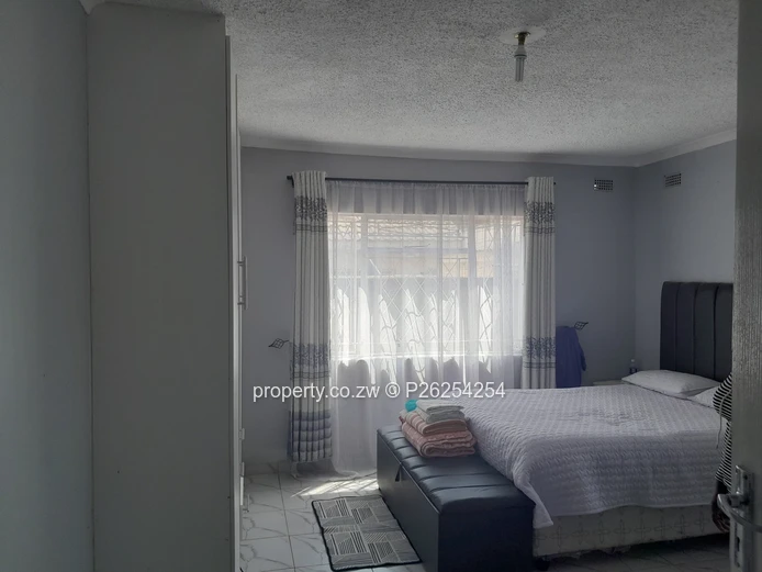 A four bedroomed house for sale in Mainway Meadows, Waterfalls in Harares