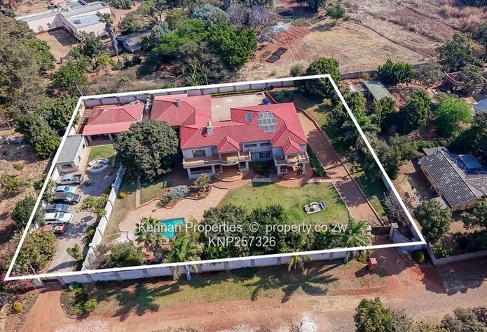  Charming 7 Bedroom Double Storey Home with a 5 Bedroom Cottage on 1 Acre