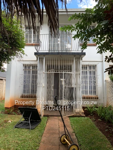 Harare CBD 2-Bed Garden Flat — Updated Kitchen & Borehole
