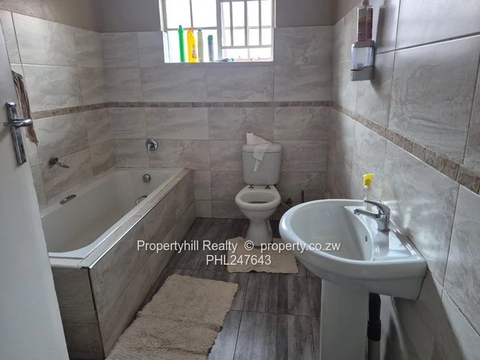 Secure 4-Bed Granary Park Home — Borehole, Garage & Paved Yard