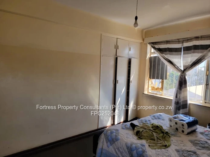 Sunlit 2-Bed Flat in Avenues CBD — Borehole (Sole Mandate)
