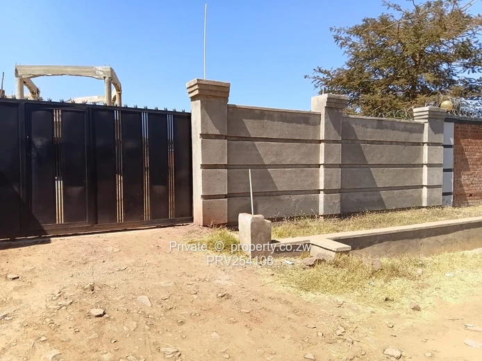 5-Bed Home with Brick Wall & Metal Gate in Pomona