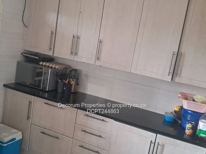 Spacious 4-Bedroom Home with Borehole in Dawnview for Rent!