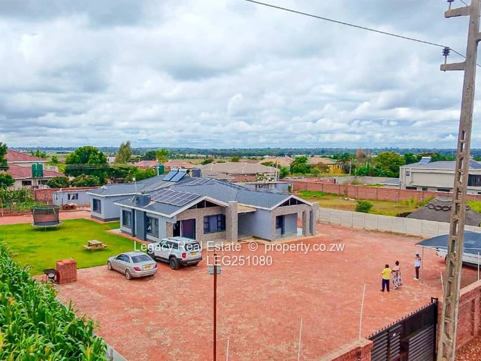 Mount Pleasant Heights: 6-Bed Townhouse Complex with Brick Yard & Borehole