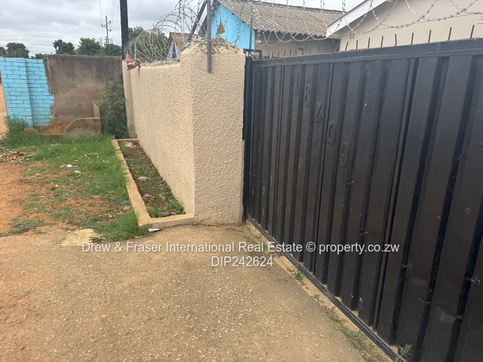 Unit L Seke 3 beds house with a cottage for sale