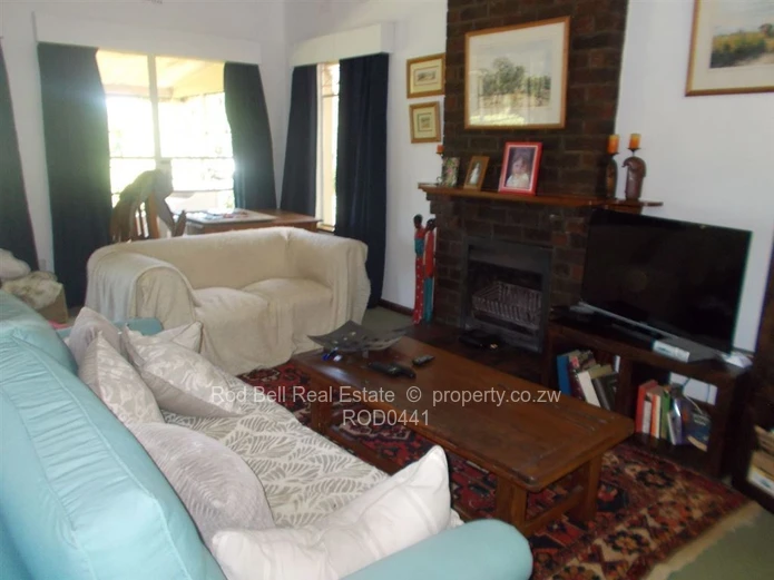 This property offers 2 homes and is set amongst stunning msasa trees