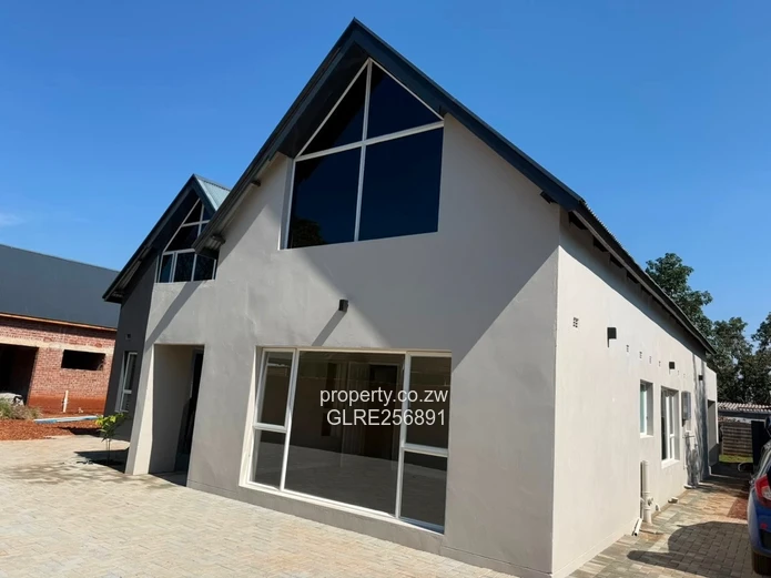 Modern 4-Bed Borrowdale Home — Double-Volume Living, Borehole