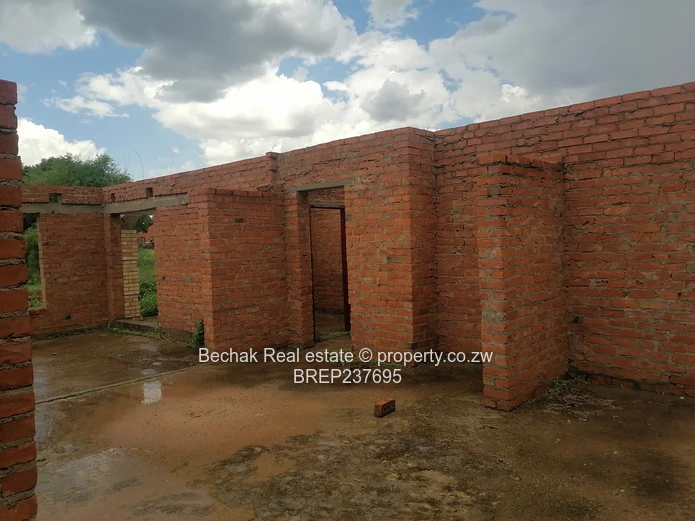 4-Bed Reigate Brick Shell on Main Road
