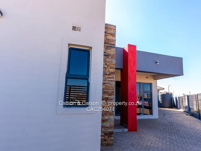 Modern 4-Bed Townhouse in Rainham — Grey & Red Accents, Pool