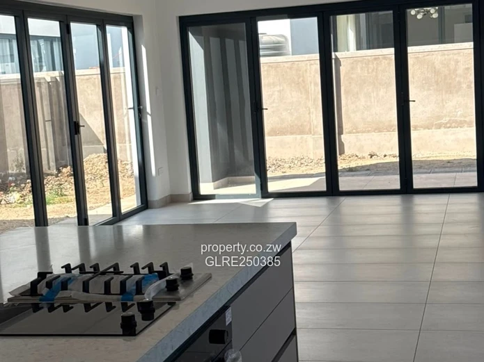 Contemporary 4-Bed Borrowdale Apt — Balcony & Borehole