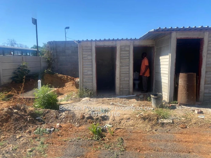 Spacious 2,420m² Walled Industrial Yard with Workshop — Bulawayo CBD