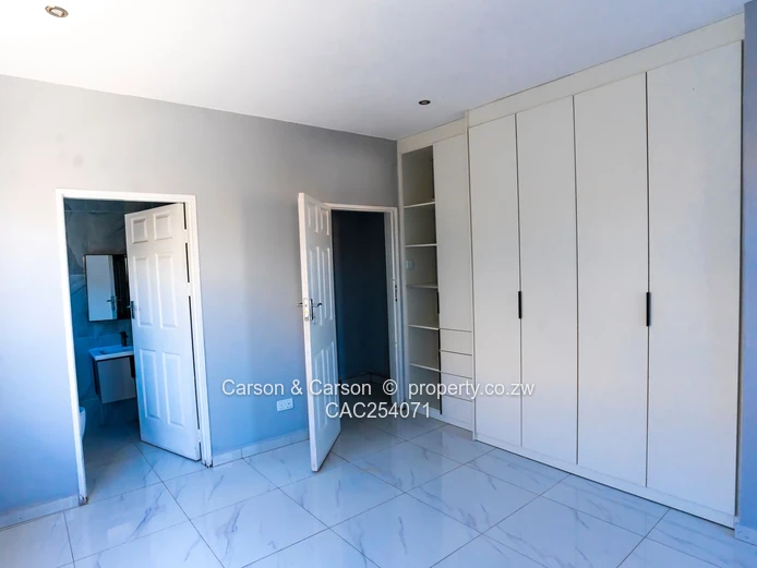 Modern 4-Bed Townhouse in Rainham — Grey & Red Accents, Pool