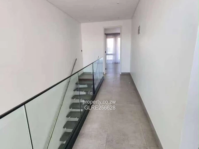 Borrowdale: Modern 4-Bed Apt w/ Glass Balconies & Borehole