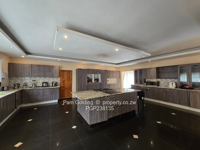 A grand palatial home- 8 bedrooms, 6 en-suite, Borehole, triple garages