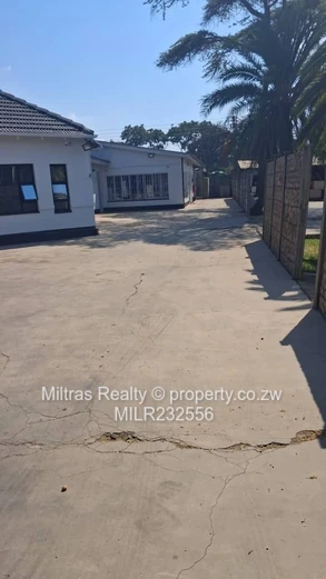 Eastlea Commercial: 1,100m² w/ Paved Yard & Borehole