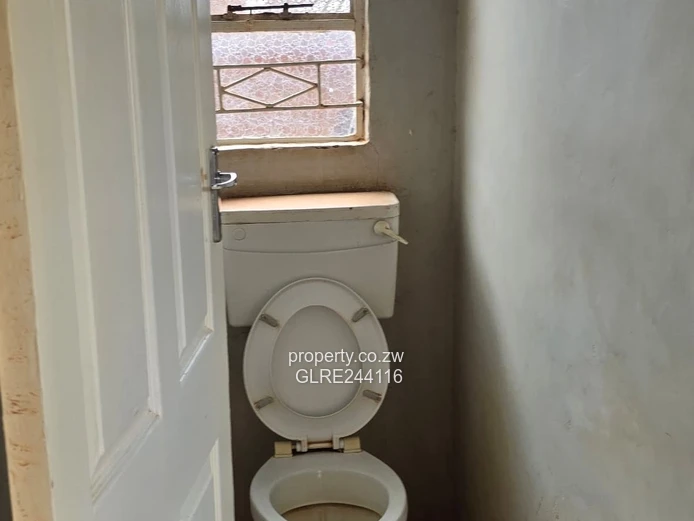 Tiled 2-Bed Kuwadzana Home — Borehole & Parking