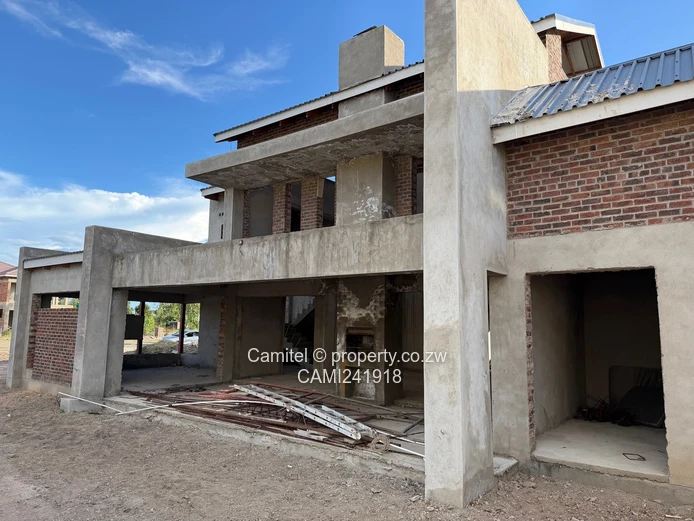 Incomplete 4 Bed double storey with a 3 bed cottage with title deed