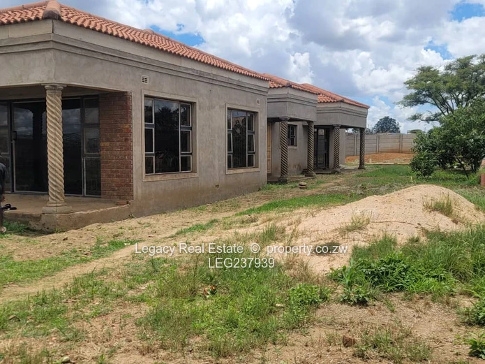 Prime Residential Plot with 4-Bedroom House to Complete