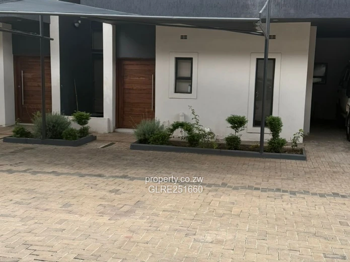 Modern 4-Bed Avondale Apt — Pools, Gym & Borehole