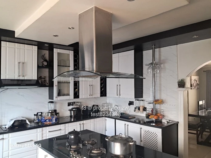 Spacious 4-Bed Home in Marimba Park — Garage & Fitted Kitchen