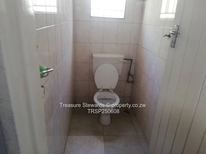 Walled 3-Bed Home with Red Gate & Verandah, Manyame Park