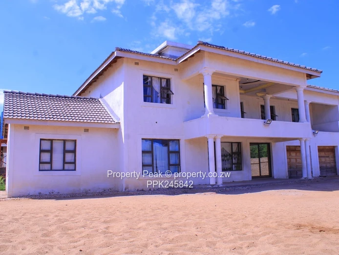 Double-Storey 4-Bed Home with Garage & Water Tank