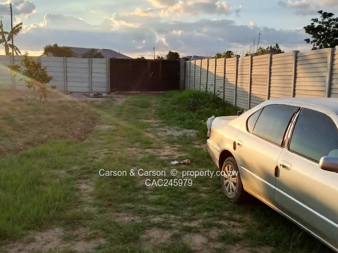 Secure Walled 450m² Stand with Gate on Gravel Road, Chitungwiza
