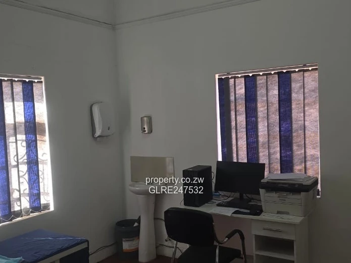 Harare CBD Office: Secure Walled Property with Paved Yard