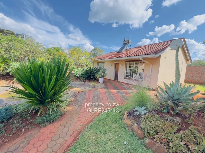 2BR Borrowdale Home — Walled Garden, Paved Drive & Water Tank