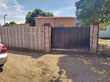 Available for sale in Highfields Zororo house 2 beds combined with tiled toilet and a shower, lounge